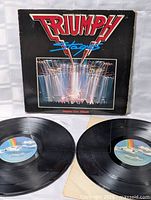 Front cover with both vinyl records displayed