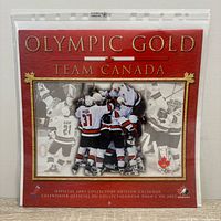 Front cover sealed in plastic displaying Olympic Gold Team Canada title and collector's edition note