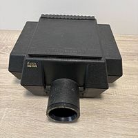 Top and front view of Artograph projector showing lens and body