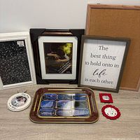 Group shot showing all items: cork board, various frames, souvenir tray