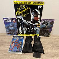 Full group shot showing program, both cereal inserts, VHS closed, gloves with module