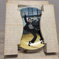 Plate inside foam insert showing Elvis Presley Jailhouse Rock image