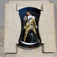 Plate in protective corrugated insert showing Elvis graphic