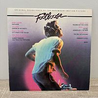 Front cover with Footloose title and dancer artwork
