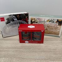 Front view of all three boxed glass serveware items