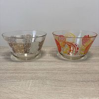 Both glass serving bowls side by side showing different patterns