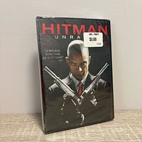 Front view of sealed DVD case with cover art and price sticker