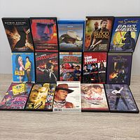 Front view of all 15 cases laid out showing cover art
