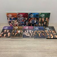 Front view of nine One Tree Hill DVD season cases