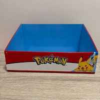 Front angled view of empty Pokémon display box