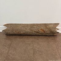 Front view showing bark-covered face of 48-inch mantel shelf