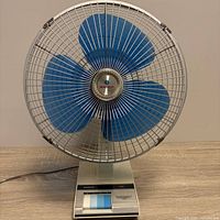 Front view of Sanyo fan showing blue blades and chrome grill