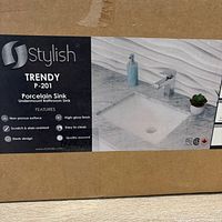 Retail box front showing Stylish Trendy P-201 porcelain undermount sink graphics