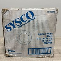 Factory box showing Sysco branding, size and model info