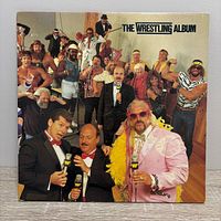 Front cover of The Wrestling Album LP showing WWF wrestlers