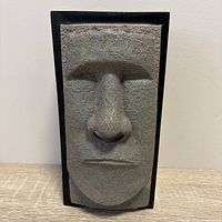 Front view gray Moai mask tissue box cover