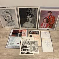 All items laid out showing relative sizes and signatures