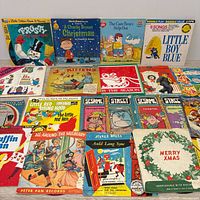 Overall view of mixed lot showing multiple children’s book & record sets