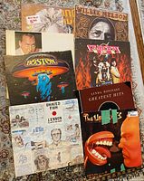 Front covers of all eight LPs laid out