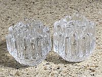 pair of Kosta Boda Polar clear glass candle holders