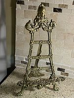 Full view of brass easel showing overall design and dimensions