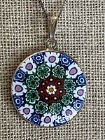 Front view of round millefiori pendant on chain