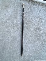 Full view of wooden cane