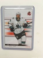 Front of Joe Thornton SP Authentic Limited card in sleeve