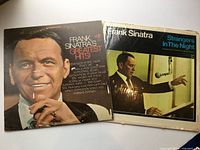 Both LP covers side by side