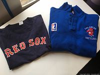 Front view of both garments folded