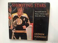 Front dust jacket showing title, author, NHL player image