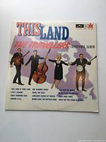 Front sleeve showing group image, title and record label details