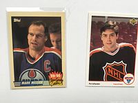 Front of Mark Messier and Pat LaFontaine cards side by side