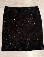 Full view of black sequined pencil skirt