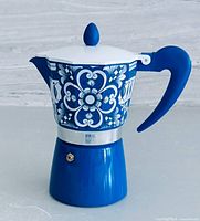 Full view of assembled blue and white Brandani moka pot