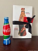 Bottle and book front view