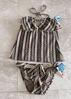 Full view of halter tankini top and matching bottoms, tags visible