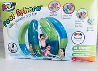 Retail box front displaying Tangle branding, Pool Sphere name, 60" diameter, product imagery