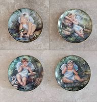 All four Tiny Blessings plates laid out