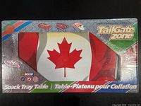 Front of boxed TailGate Zone snack tray table showing Canadian flag design