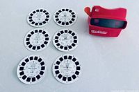 View-Master viewer with six reels arranged around it
