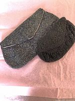 Overview of both beaded items: envelope clutch and smaller pouch