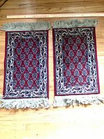 Front view of both matching rugs showing pattern, color and fringe