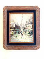 Full view of framed painting showing artwork and wood frame