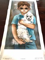 Full view of unframed Walter Keane reproduction poster showing boy with dog and white margins