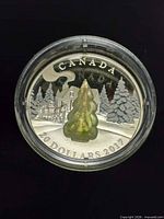 Reverse of coin showing Murano glass tree and denomination