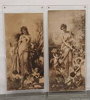 Both framed Hans Zatska prints side by side