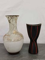 Both vases side by side showing overall forms and relative sizes