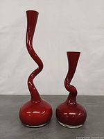 Front view showing both vases and their twisted forms