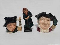 Front view of three Royal Doulton pieces